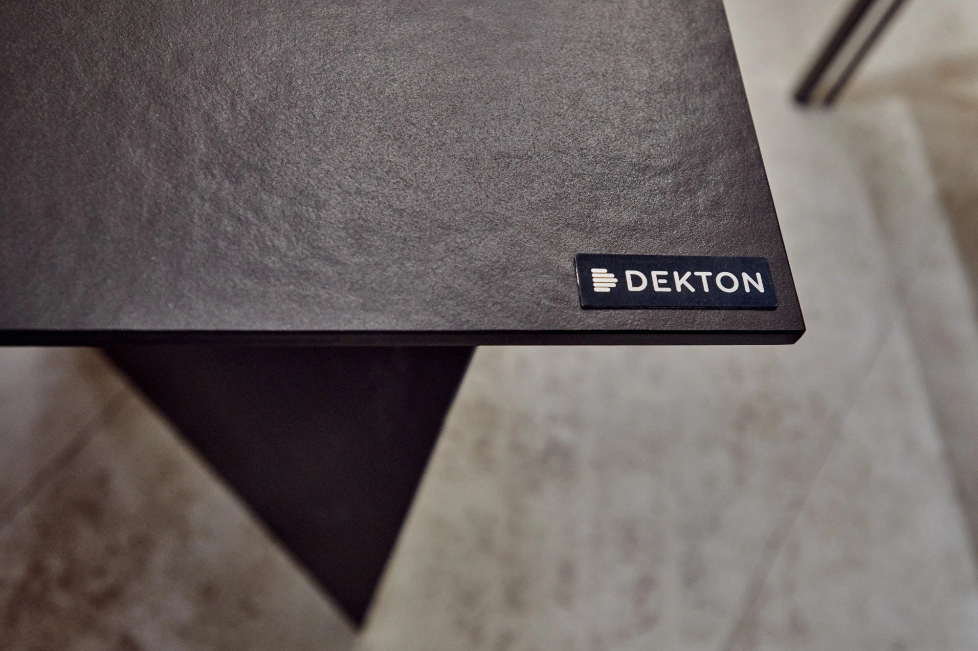 Dekton Nilium countertop with dark charcoal finish and straight edge detail — premium dekton surfaces fabricated and installed by Signature Stone LV