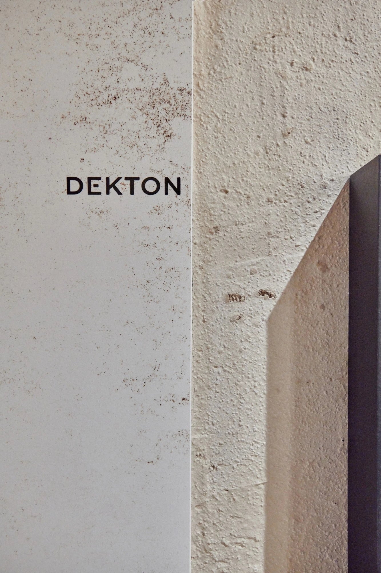 Dekton Nilium surface with light beige textured finish and geometric edge detail — premium dekton countertops installed by Signature Stone Las Vegas