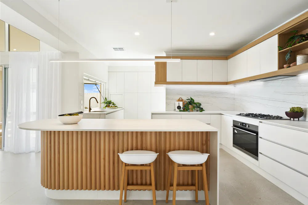 Silestone Nolita quartz kitchen island and countertops with white finish and fluted wood base — quartz countertops near me by Signature Stone Las Vegas