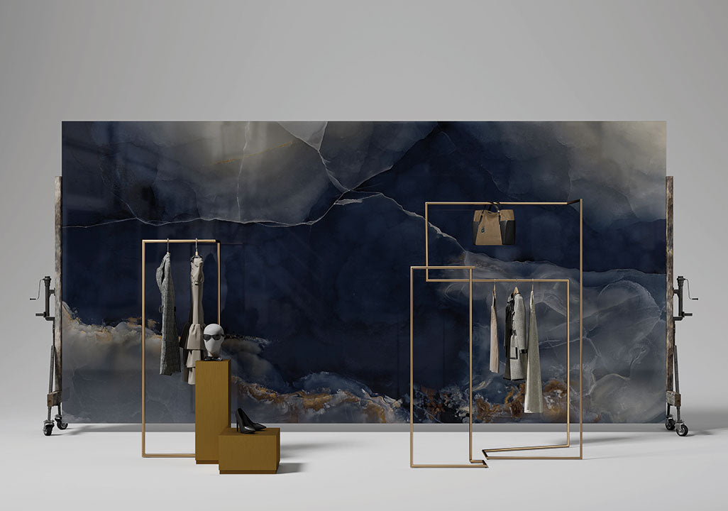 Onyx Misterioso display featuring dramatic blue and gray veining with gold accents — perfect for custom countertops fabricated and installed by Signature Sto...