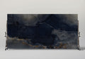 Onyx Misterioso slab with dramatic navy blue and gray veining with gold accents — elegant stone countertops installed by Signature Stone Las Vegas
