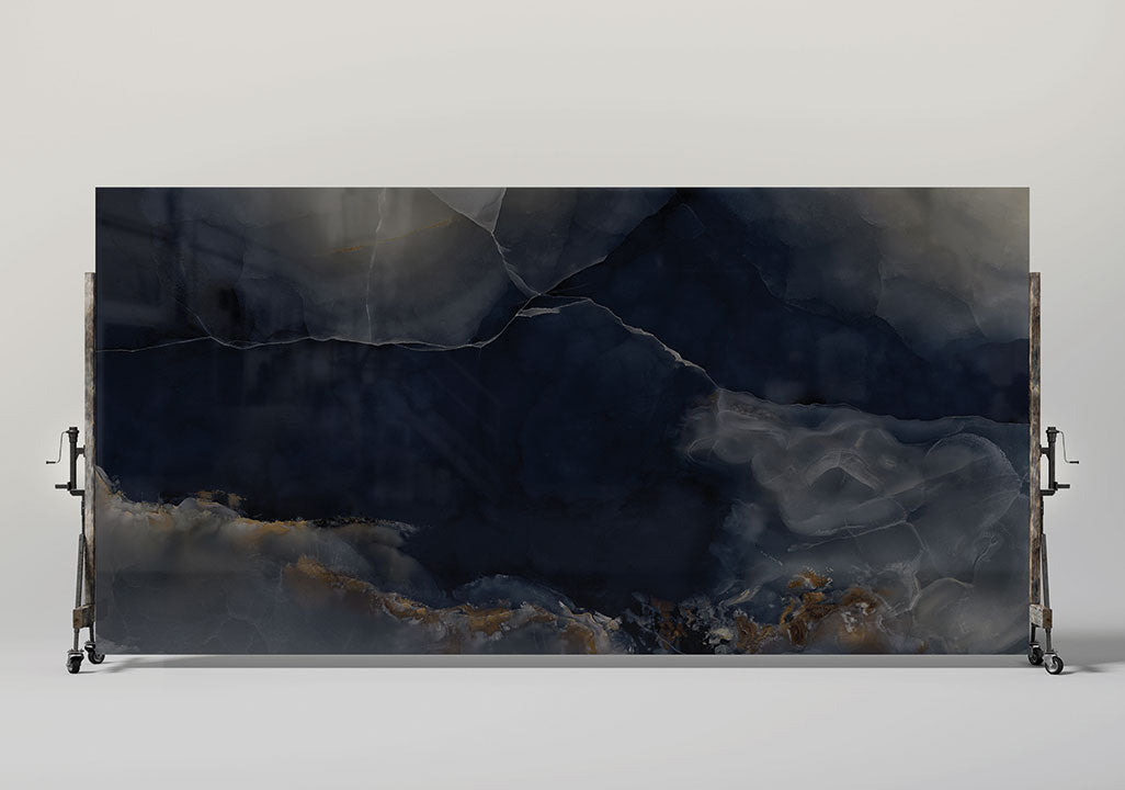 Onyx Misterioso slab with dramatic navy blue and gray veining with gold accents — elegant stone countertops installed by Signature Stone Las Vegas