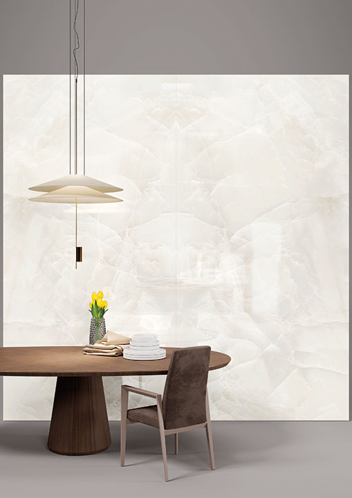 Onyx Nuvolato wall installation with white veining and polished finish in modern dining room — premium countertop fabrication by Signature Stone Las Vegas