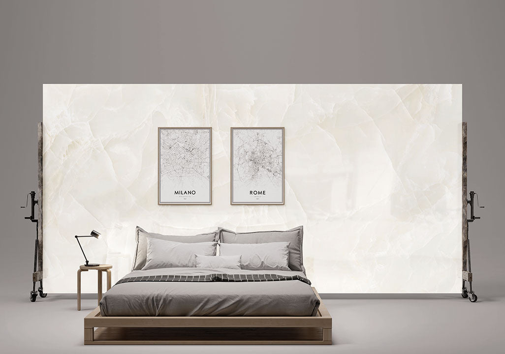 Onyx Nuvolato bedroom wall with flowing white and gray veining in polished finish — custom countertops fabricated and installed by Signature Stone LV