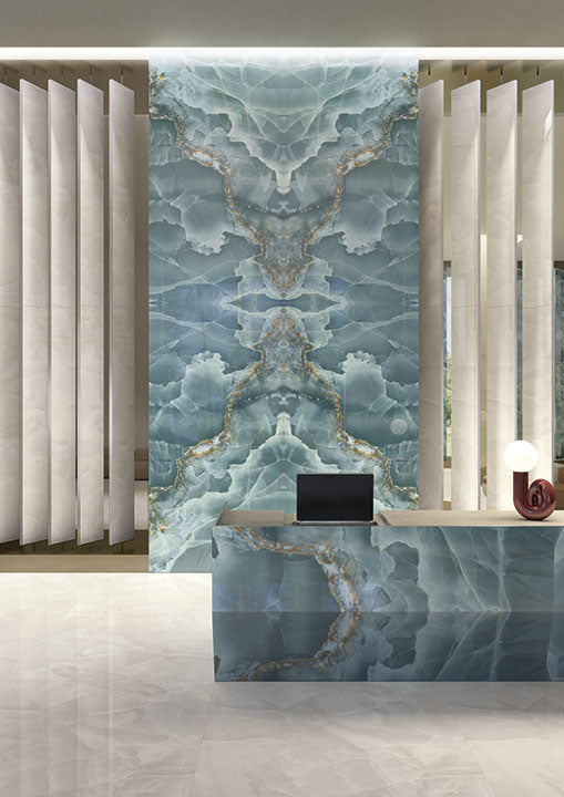 Onyx Oceano accent wall with blue-gray veining and gold details — luxury stone countertops installed by Signature Stone Las Vegas