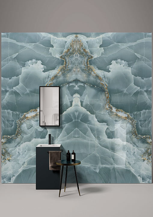Onyx Oceano wall installation featuring blue and white veining with gold accents — expert countertop fabrication by Signature Stone Las Vegas