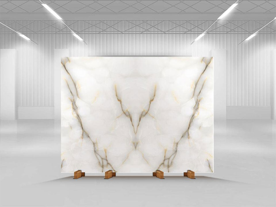Onyx Perla slab with white marble appearance and gold veining patterns — premium stone countertops installed by Signature Stone Las Vegas