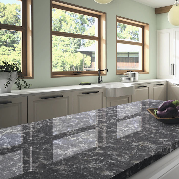 Silestone Ocean Storm kitchen island with dramatic dark veining and polished finish — engineered quartz countertops fabricated and installed by Signature Sto...