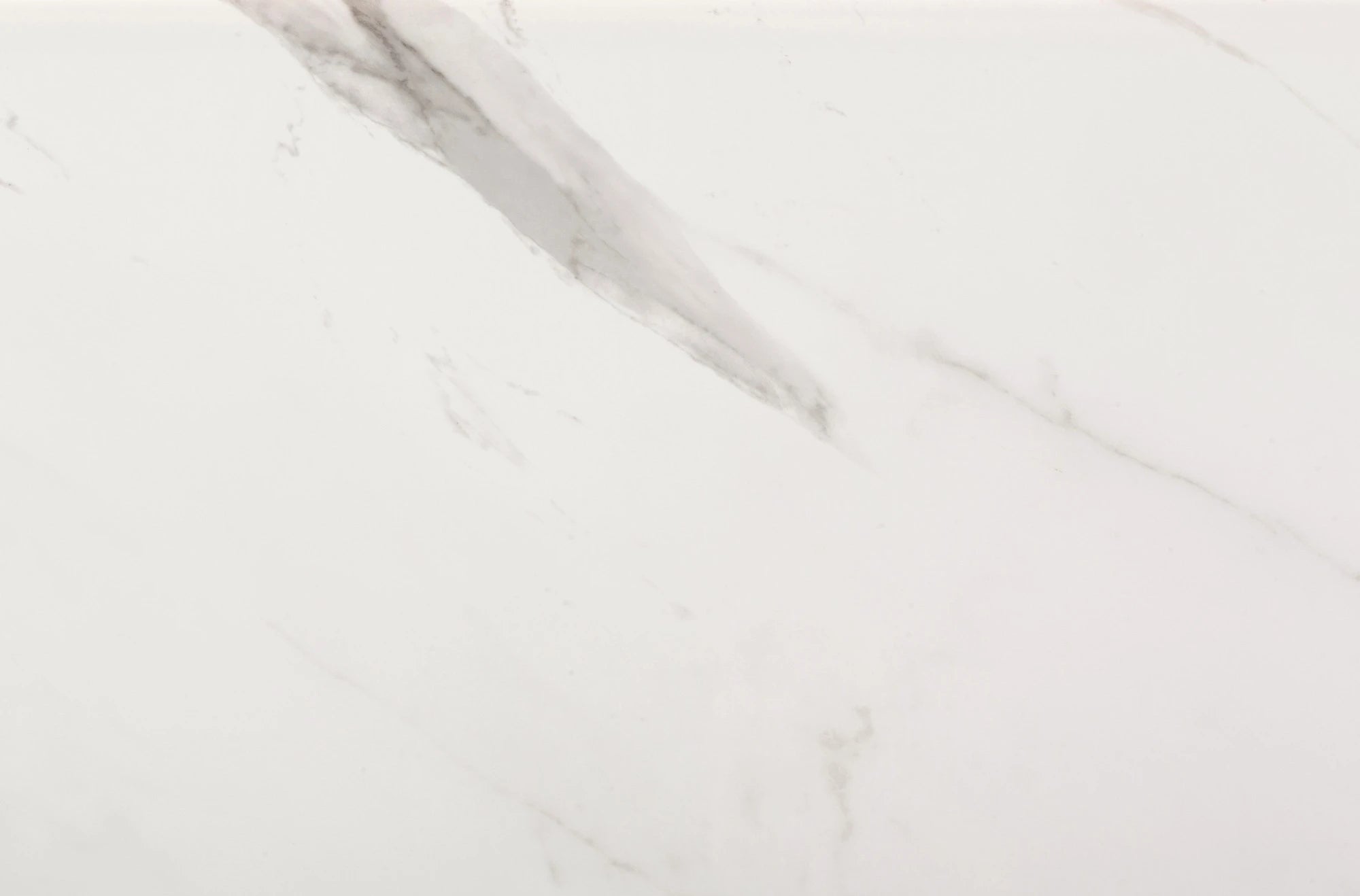 Dekton Olimpo surface with subtle white and gray veining and smooth finish — premium dekton countertops installed by Signature Stone Las Vegas