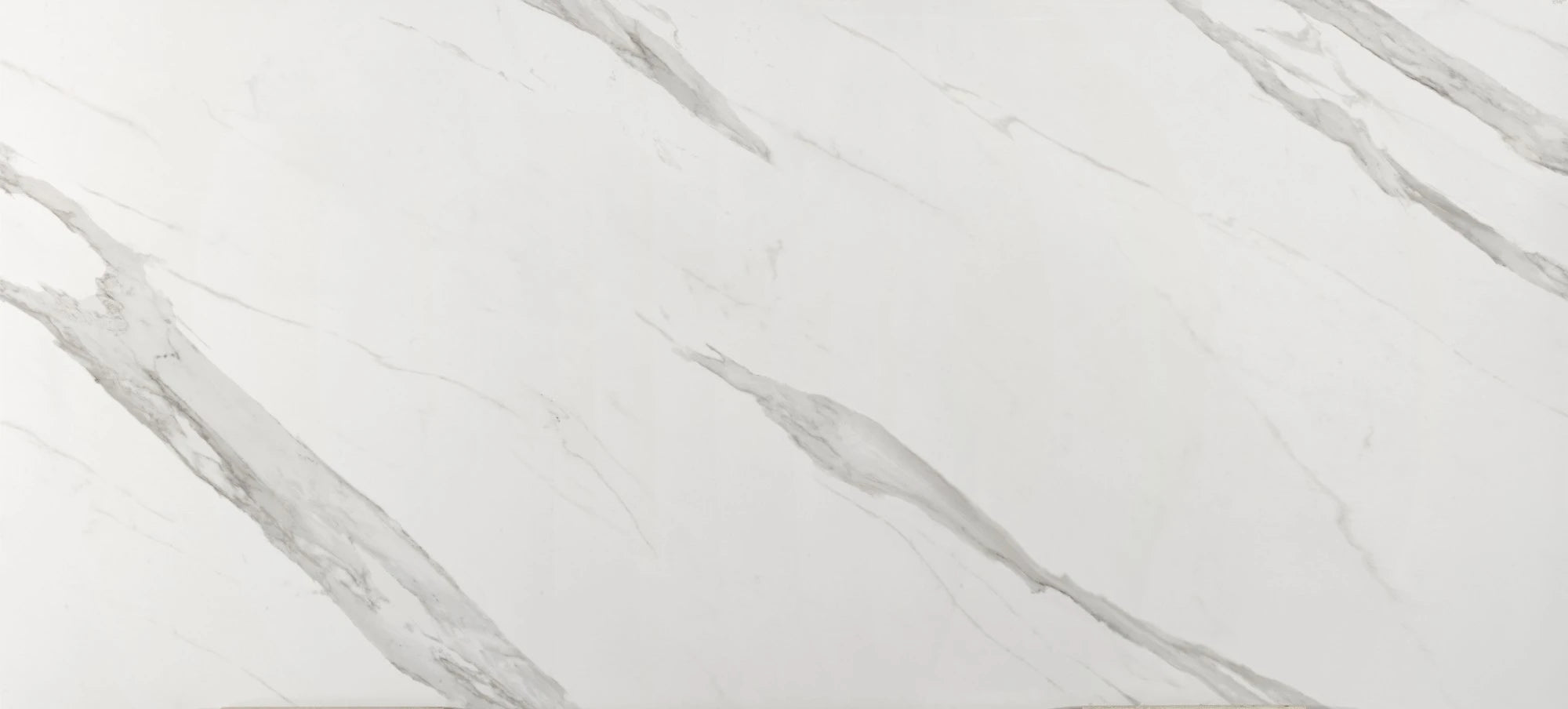 Dekton Olimpo countertop surface with white marble-look veining and smooth polished finish — premium dekton surfaces fabricated and installed by Signature St...