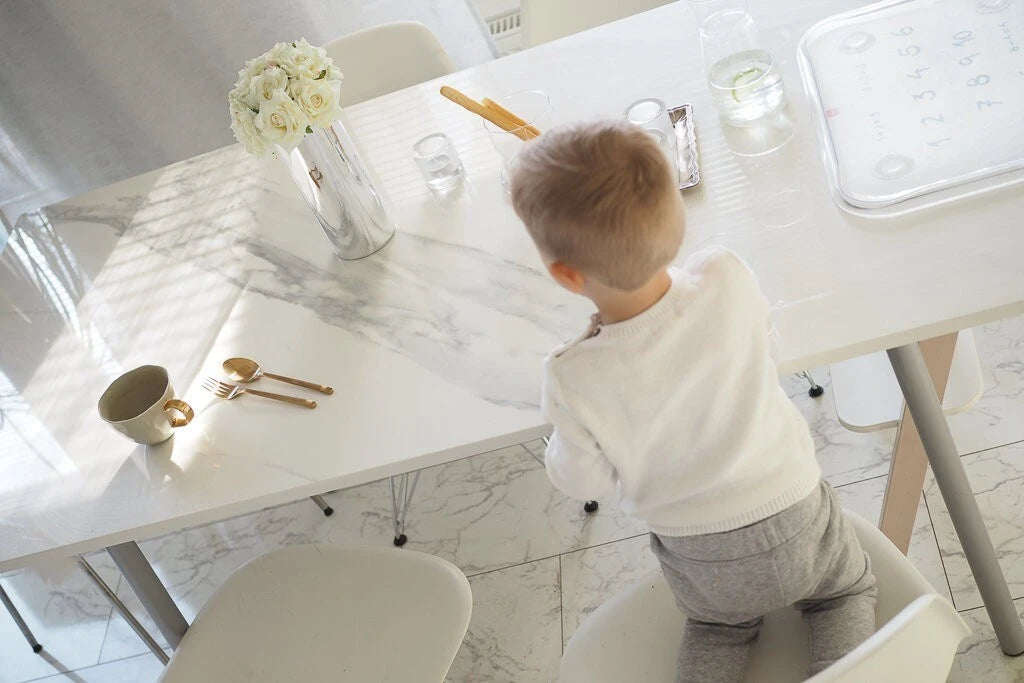 Dekton Olimpo kitchen island with white marble-look finish and clean edges — premium dekton kitchen countertops by Signature Stone Las Vegas