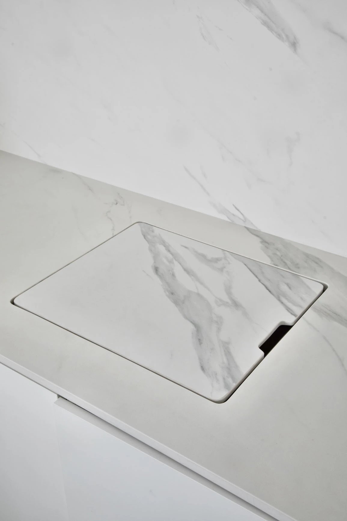 Dekton Opera bathroom vanity with white marble-look veining and integrated rectangular sink — premium dekton surfaces fabricated and installed by Signature S...