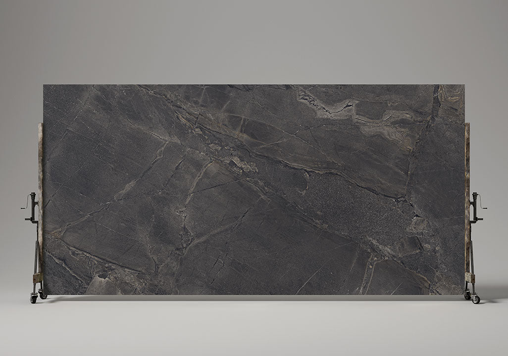 Pietra Rustica slab with dark charcoal finish and natural veining patterns — premium stone countertops installed by Signature Stone Las Vegas