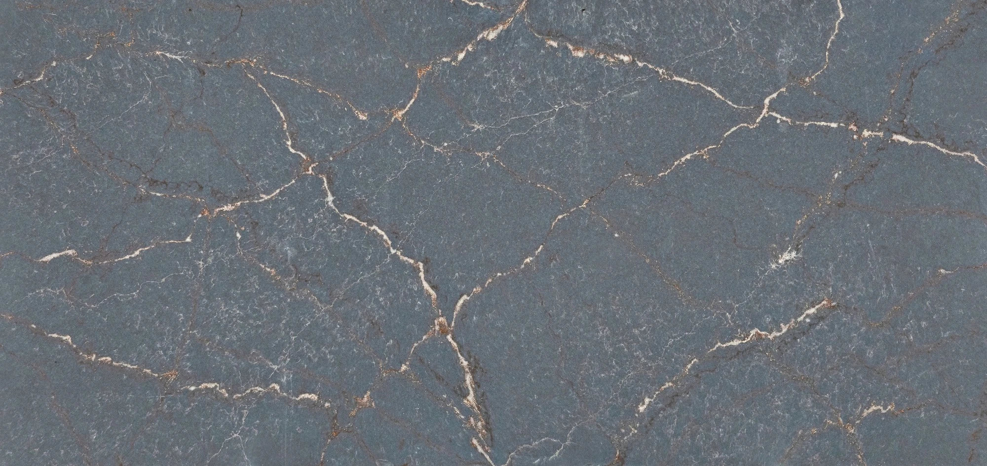 Silestone Parisien Bleu surface with deep blue-gray color and white veining — engineered quartz countertops fabricated and installed by Signature Stone LV
