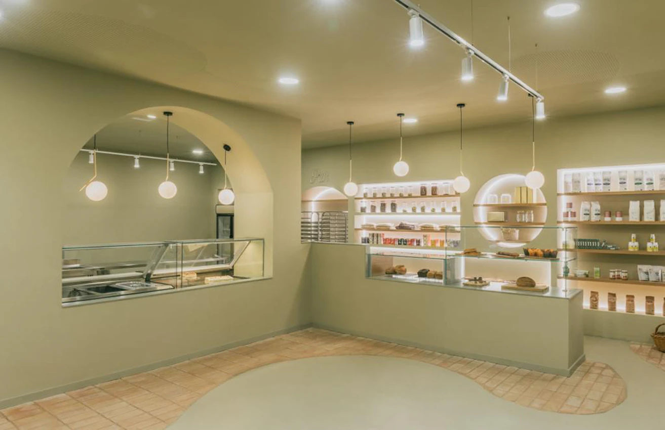 Silestone Posidonia Green quartz commercial display counters with sleek edges and matte finish — quartz countertops near me by Signature Stone Las Vegas