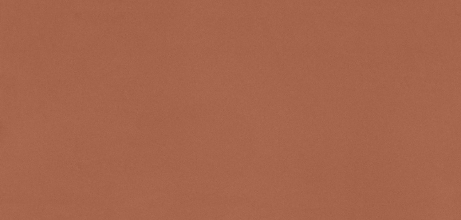 Silestone Arcilla Red kitchen surface featuring warm terracotta color with smooth matte finish — quartz countertops installed by Signature Stone Las Vegas