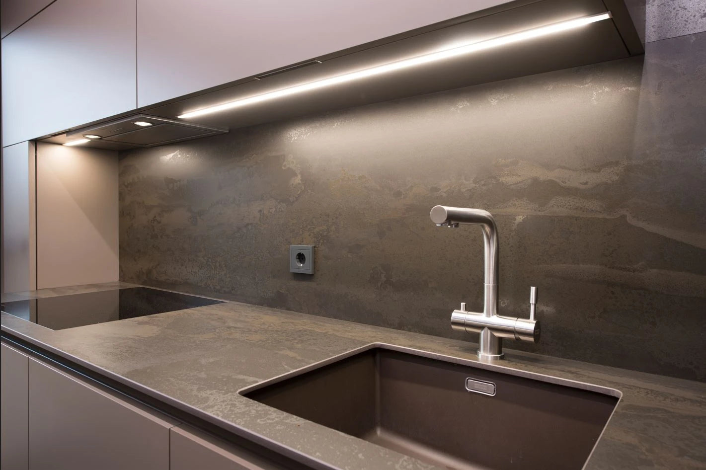 Dekton Radium kitchen countertop with integrated sink, matte gray finish and clean lines — premium dekton surfaces fabricated and installed by Signature Ston...