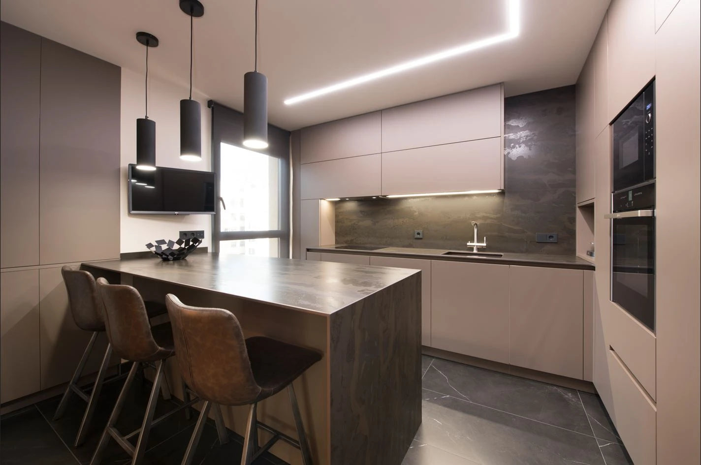 Dekton Radium kitchen island with dark veined surface and matching backsplash — stunning dekton kitchen countertops by Signature Stone Las Vegas