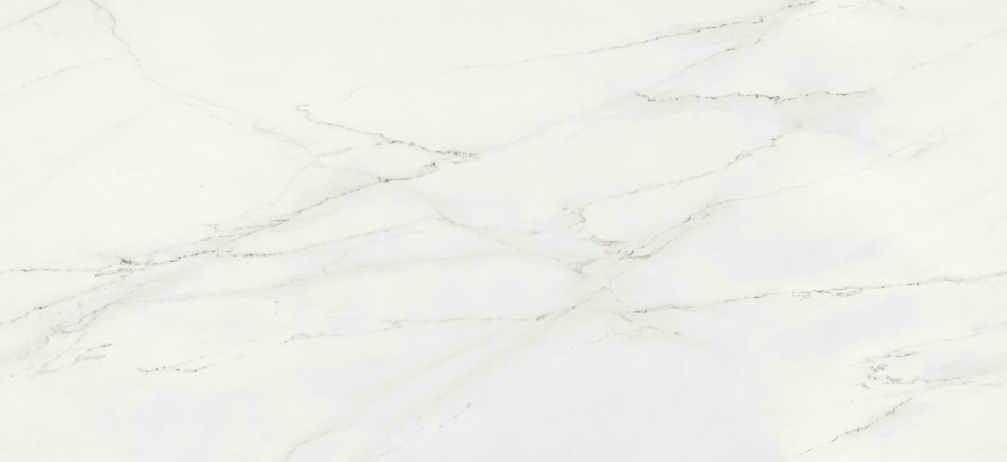 Dekton Rem countertop surface with light cream base and subtle gray veining — premium dekton surfaces fabricated and installed by Signature Stone LV