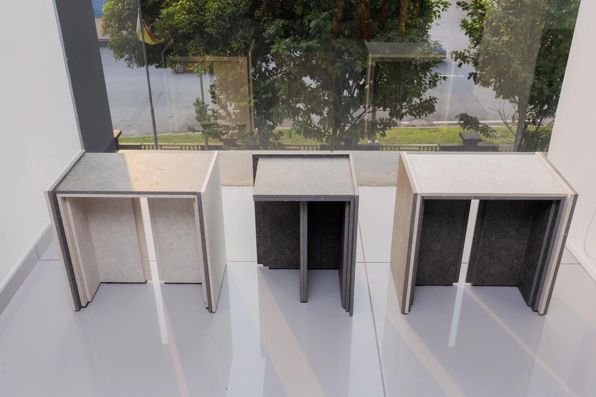 Dekton Sabbia outdoor kitchen countertops in neutral beige tone with clean edges — premium dekton surfaces fabricated and installed by Signature Stone LV