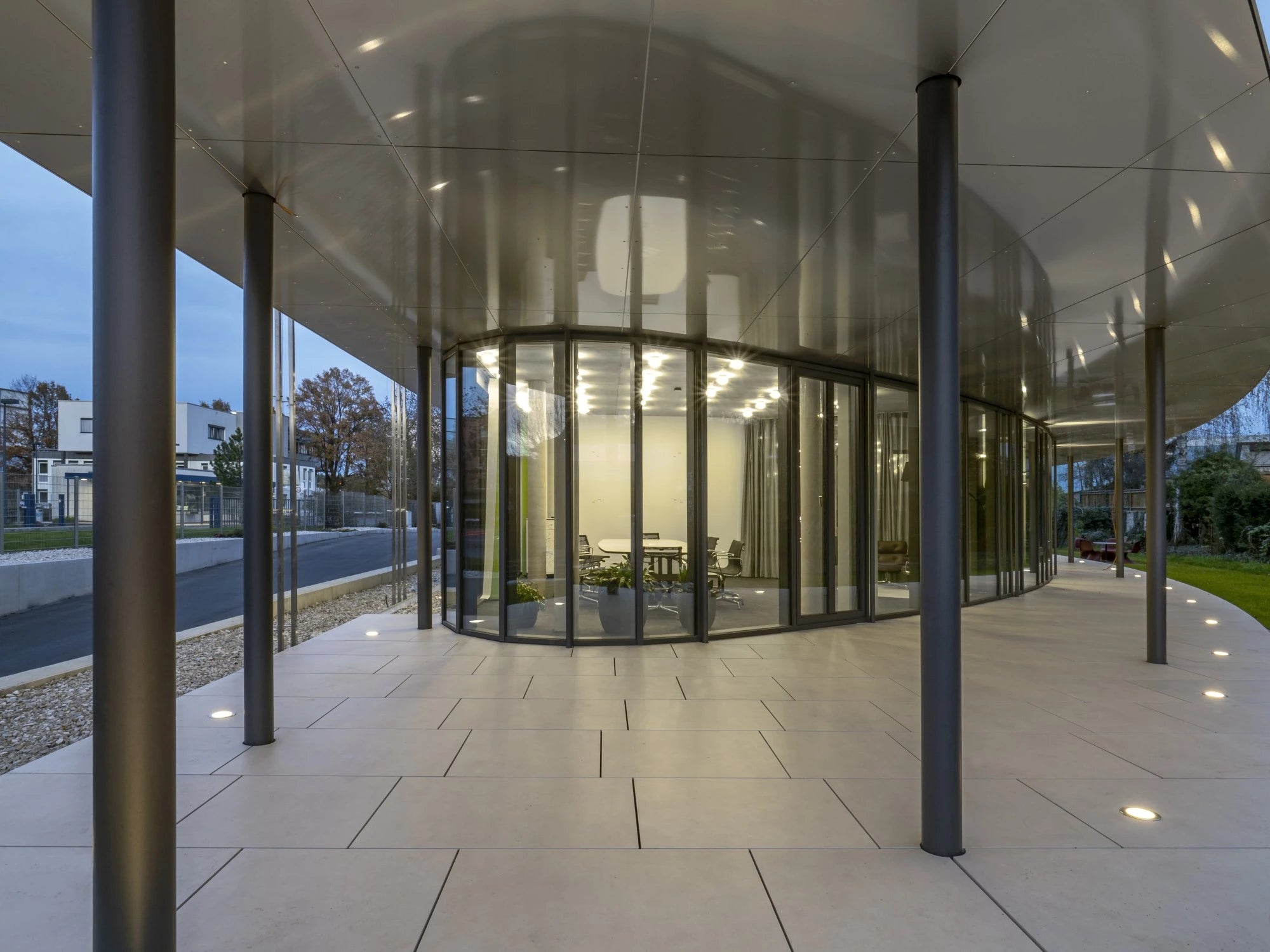 Dekton flooring in modern commercial building with light neutral finish and geometric pattern — premium dekton surfaces fabricated and installed by Signature...