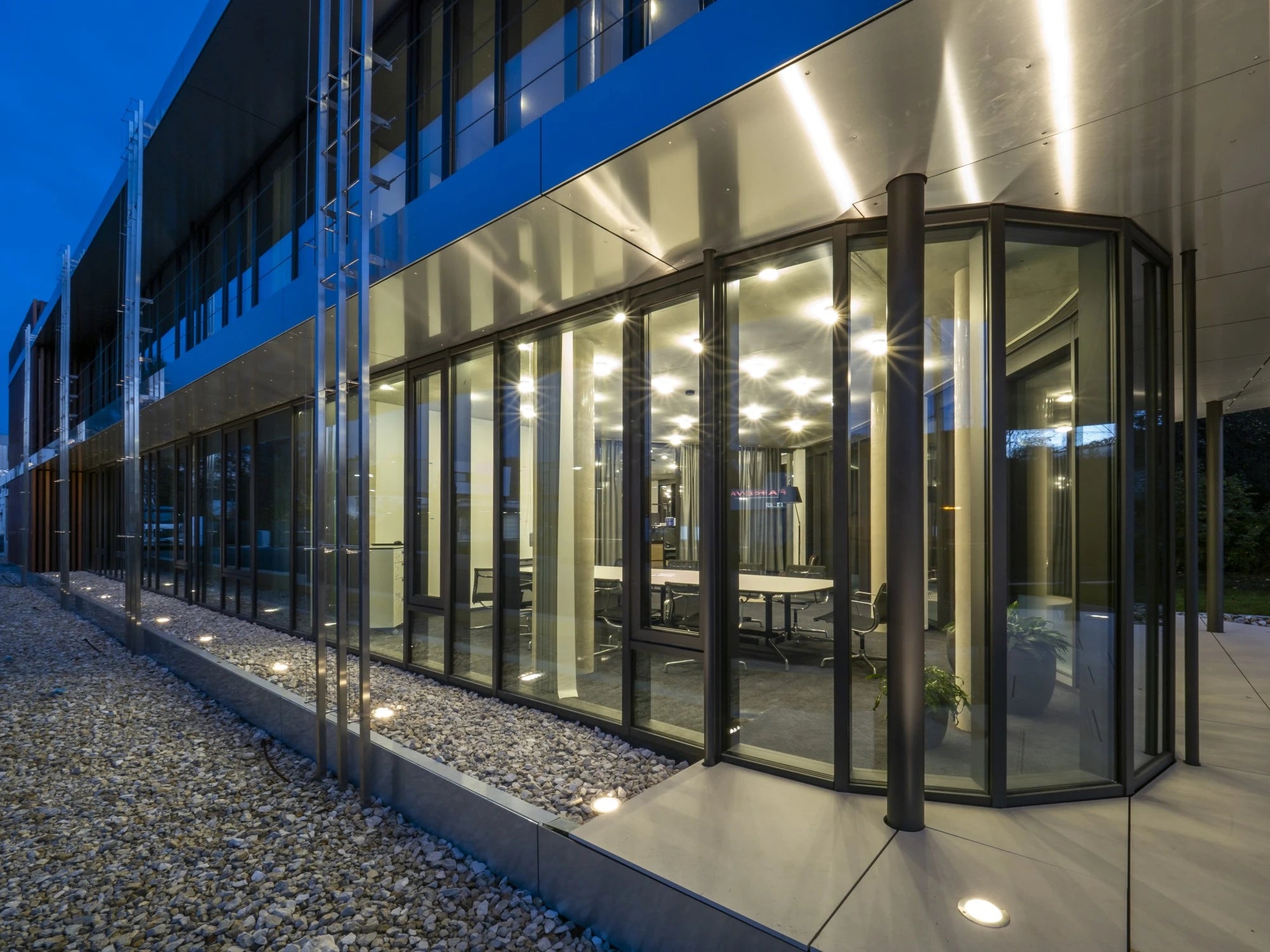 Dekton Sasea commercial conference room installation with sleek gray finish and floor-to-ceiling windows — premium dekton surfaces fabricated and installed b...