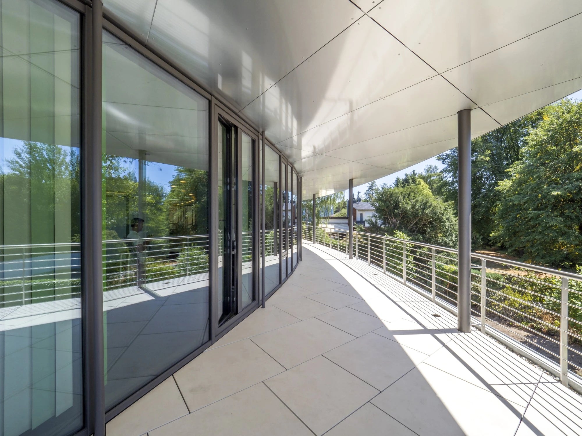 Dekton Sasea exterior flooring with light gray finish and modern geometric pattern — premium dekton surfaces fabricated and installed by Signature Stone LV