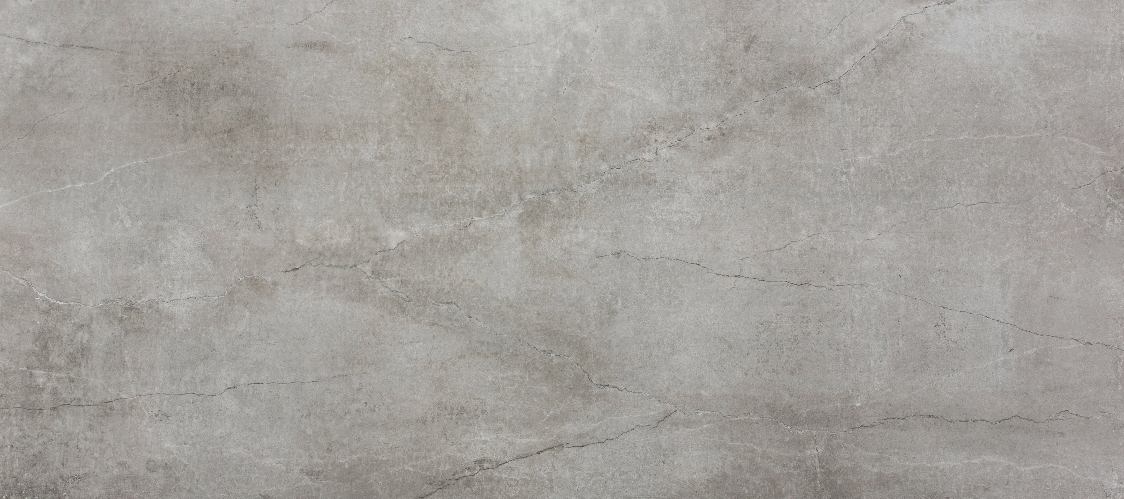 Dekton Soke surface with light gray tones and natural stone veining patterns — premium dekton surfaces fabricated and installed by Signature Stone LV