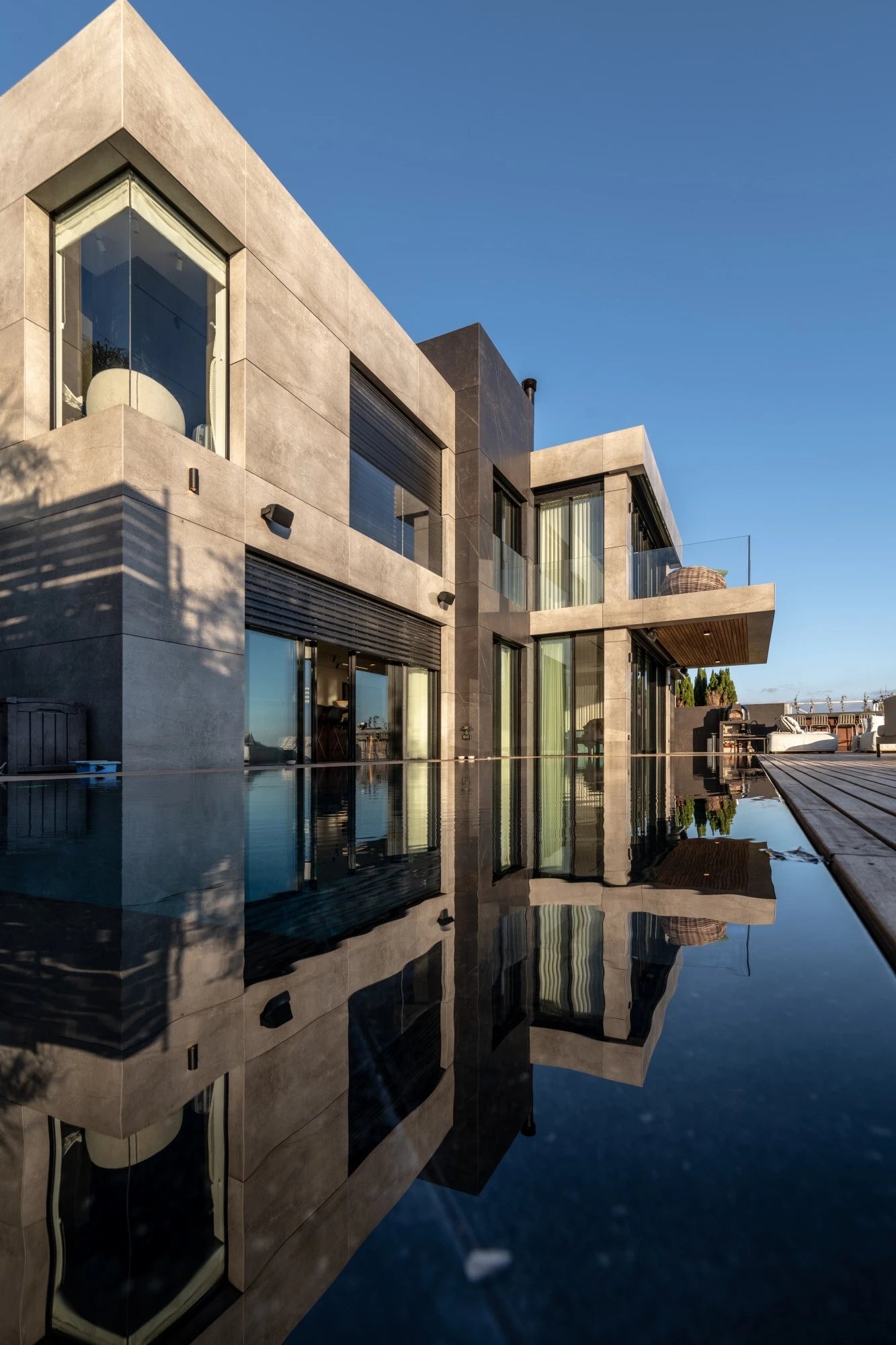 Dekton Soke exterior cladding with warm beige tones and smooth matte finish on modern home facade — dekton countertops installed by Signature Stone Las Vegas