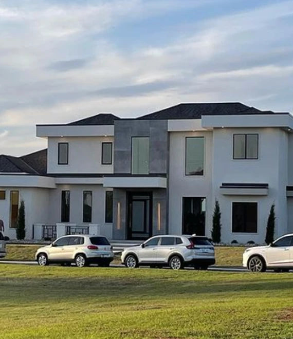 Dekton Soke exterior cladding with light gray finish and clean lines — premium dekton surfaces fabricated and installed by Signature Stone LV