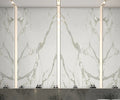 Statuario Michelangelo marble wall panels with dramatic white and gray veining — premium stone countertops installed by Signature Stone Las Vegas