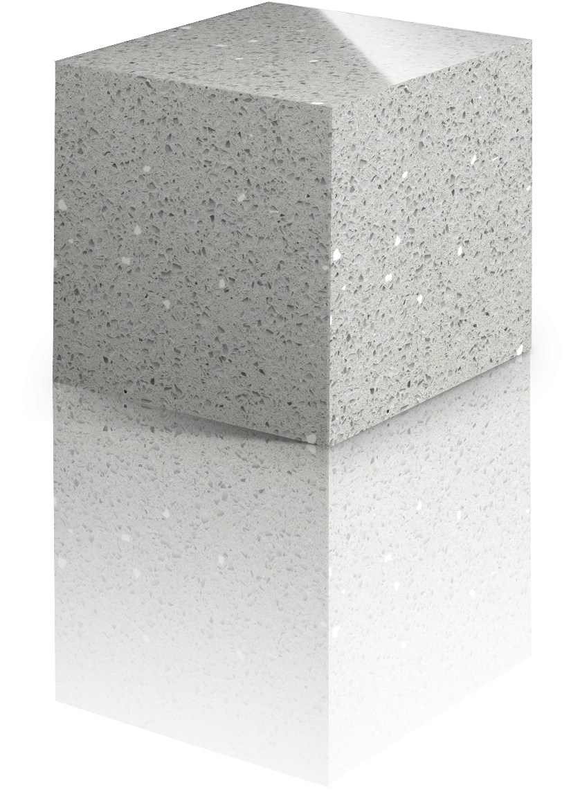 Silestone Stellar Snow sample block with white speckled pattern and polished finish — engineered quartz countertops fabricated and installed by Signature Sto...