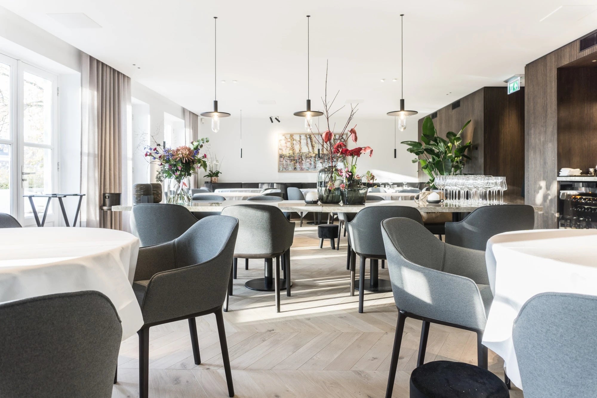 Dekton Taga dining table with sleek gray finish and modern edge detail — premium dekton countertops installed by Signature Stone Las Vegas