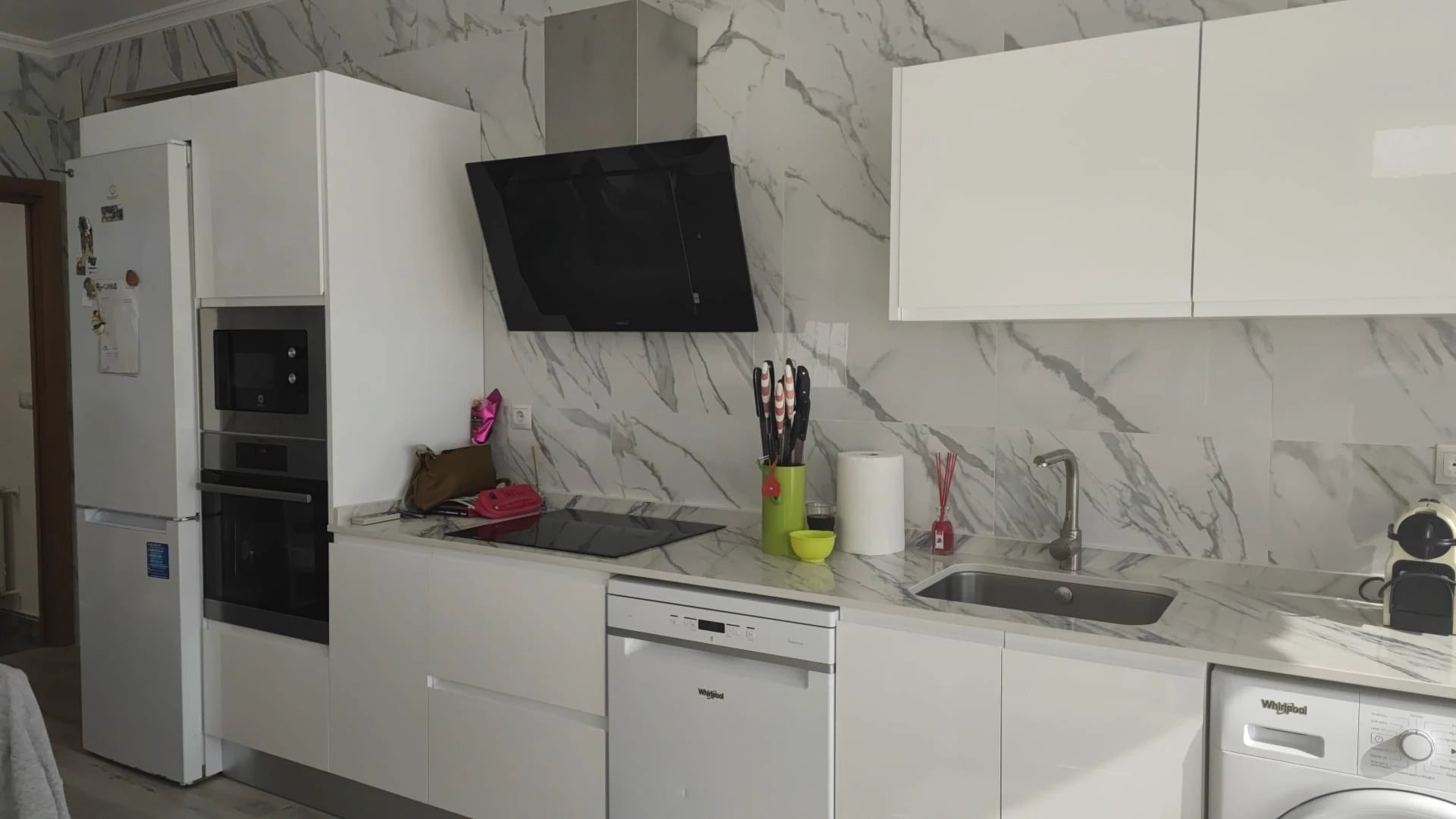 Dekton Trance kitchen countertops with white marble-look veining and straight edges — premium dekton surfaces fabricated and installed by Signature Stone LV
