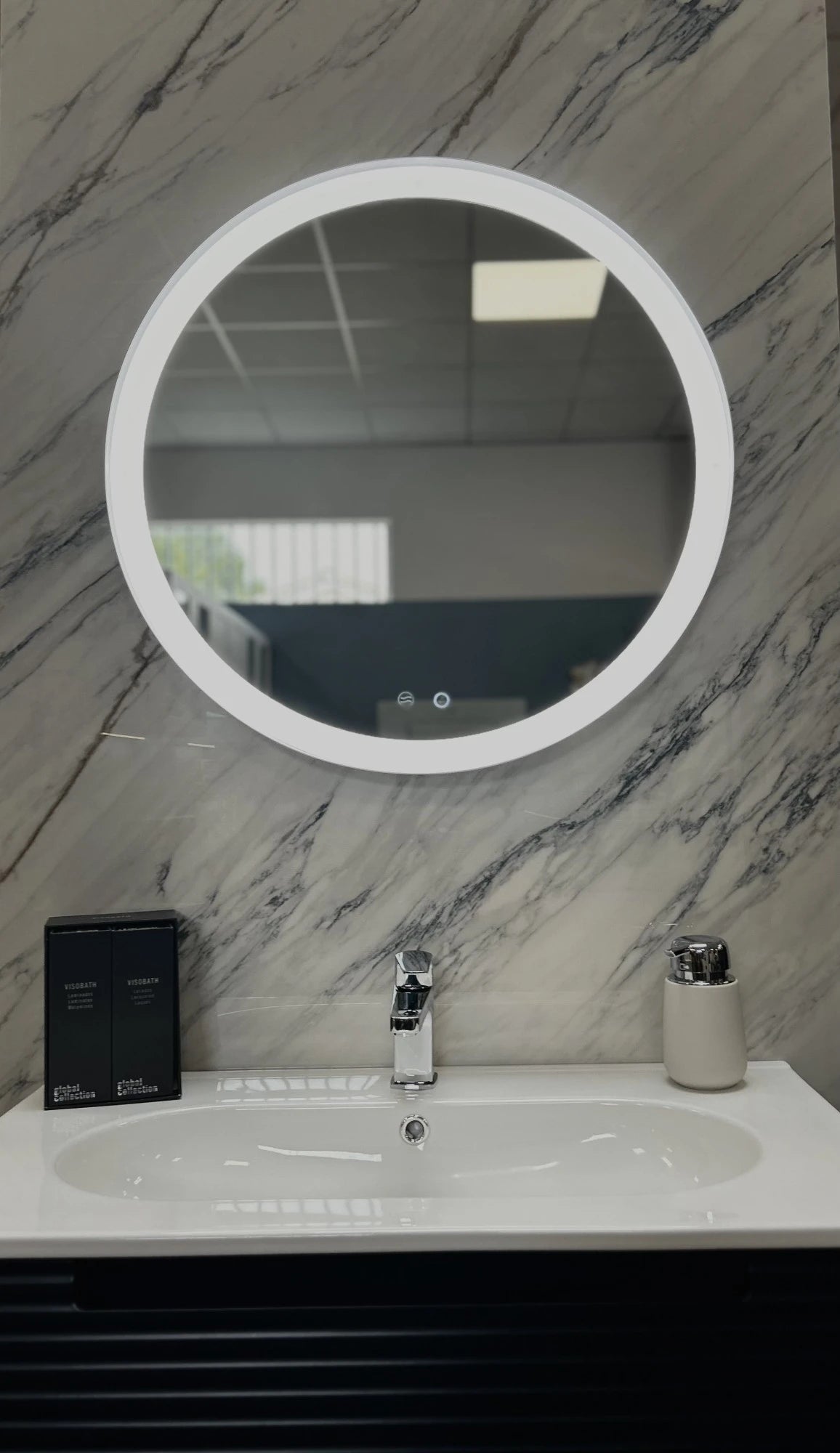 Dekton Trance bathroom vanity with white marble-look veining and sleek finish — premium dekton surfaces fabricated and installed by Signature Stone LV