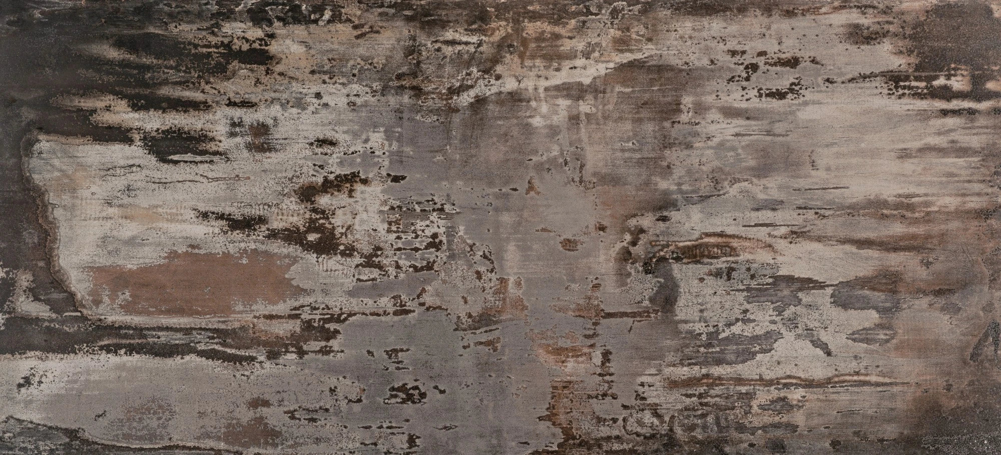 Dekton Trilium slab showing weathered concrete texture with gray and brown tones — premium dekton surfaces fabricated and installed by Signature Stone LV