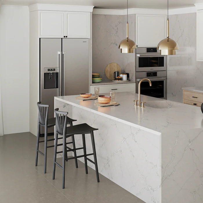 Silestone Victorian Silver kitchen island with white marble-look veining and waterfall edge — engineered quartz countertops fabricated and installed by Signa...