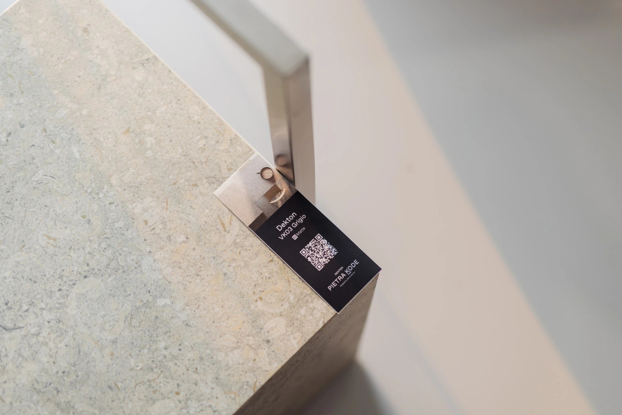 Dekton Vk03 Grigio stone slab sample with speckled gray finish and smooth surface — dekton countertops installed by Signature Stone Las Vegas