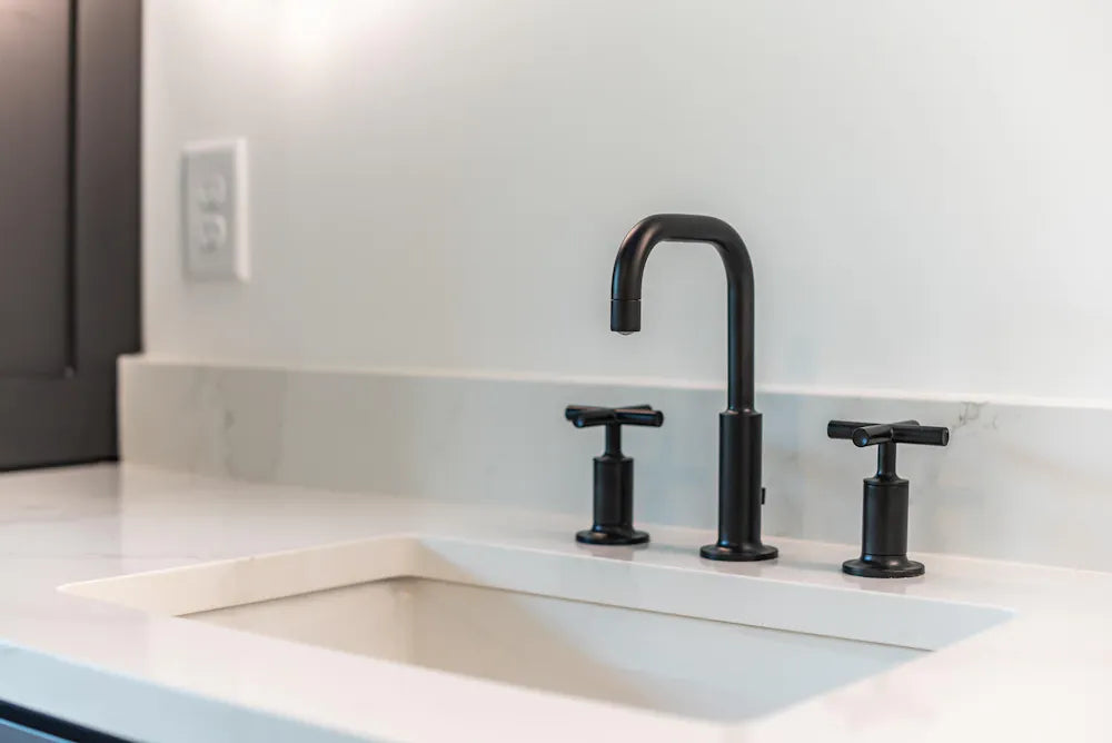 Silestone White Storm quartz bathroom vanity with clean white surface and modern black faucet — premium quartz countertops near me by Signature Stone Las Vegas