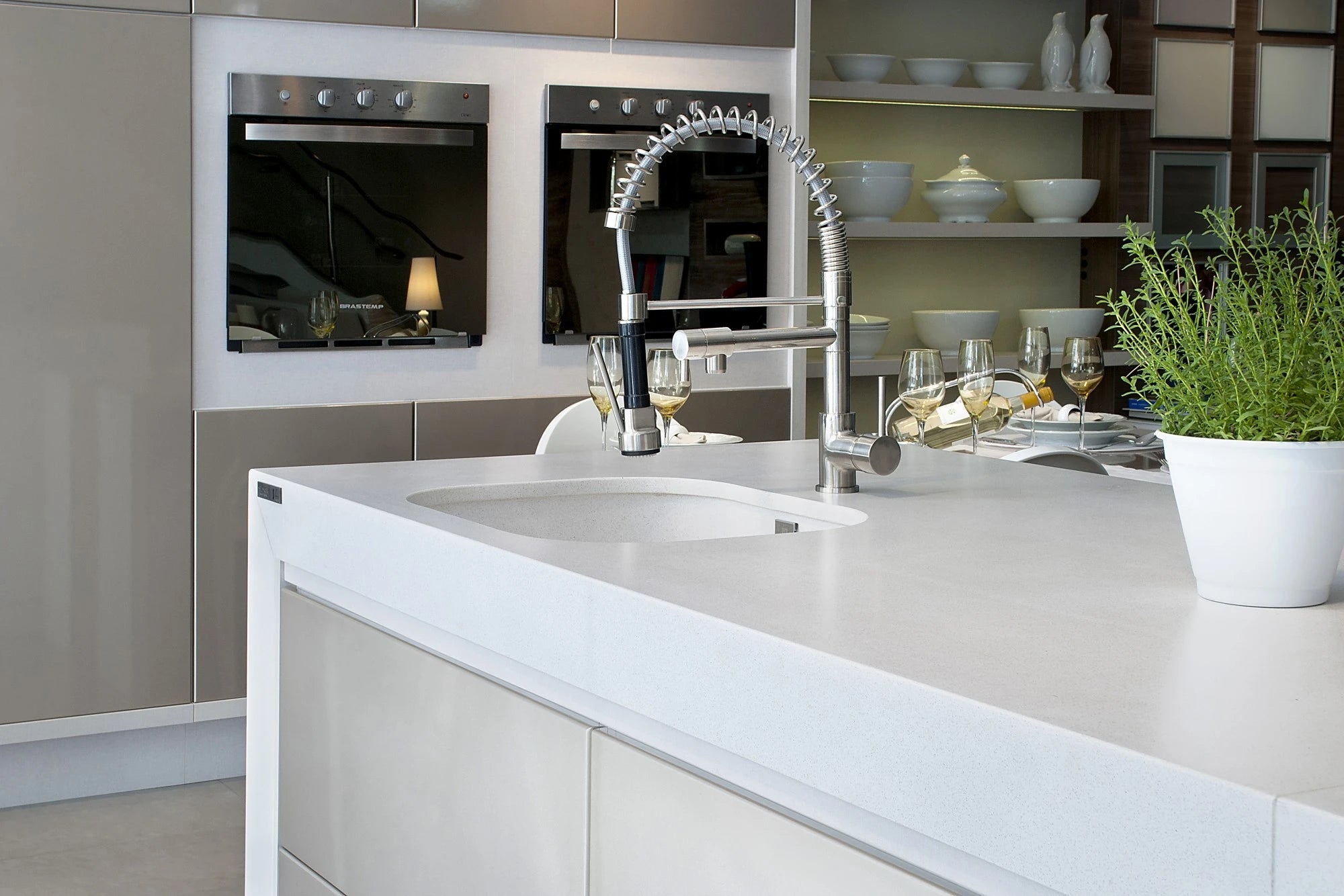Silestone White Storm kitchen island with pristine white finish and integrated sink — premium quartz countertops installed by Signature Stone Las Vegas