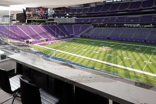 Annicca quartz countertop with white and gray veining in luxury stadium suite — custom countertops fabricated and installed by Signature Stone LV