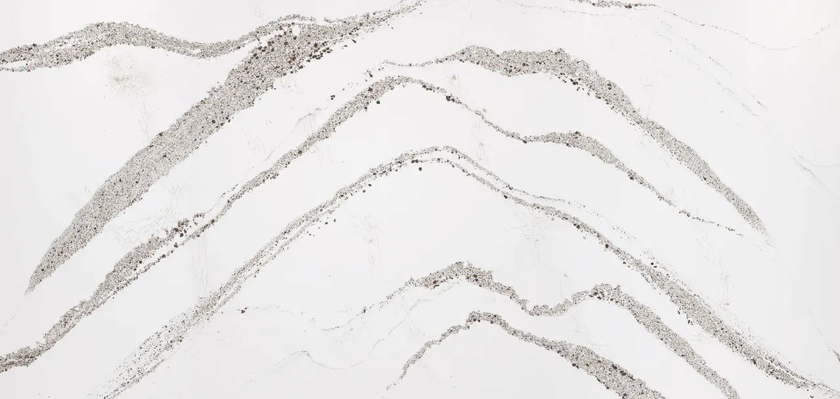 Annicca quartz surface with flowing gray and white veining pattern — elegant stone countertops installed by Signature Stone Las Vegas
