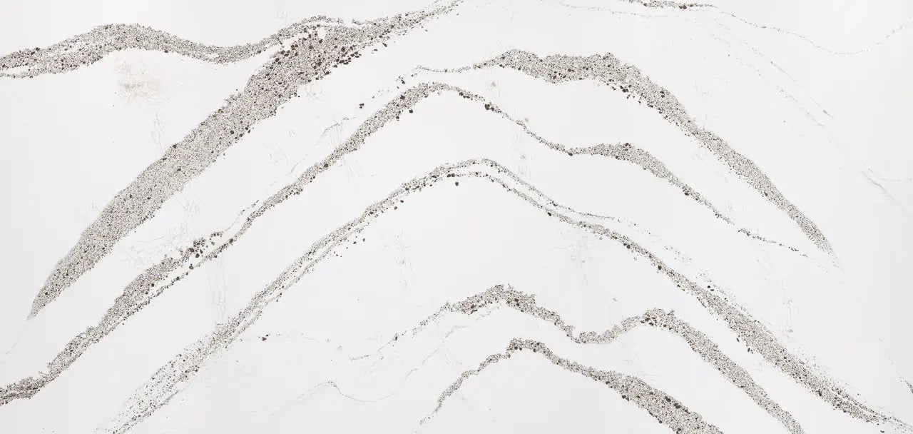 Annicca quartz surface with flowing gray and white veining pattern — elegant stone countertops installed by Signature Stone Las Vegas
