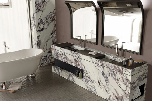 Arabescato Violet marble bathroom vanity with white and purple veining and black countertop — luxury stone countertops installed by Signature Stone Las Vegas