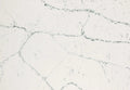 Quartz slab surface with light gray base and dark gray veining — premium countertop fabrication by Signature Stone Las Vegas