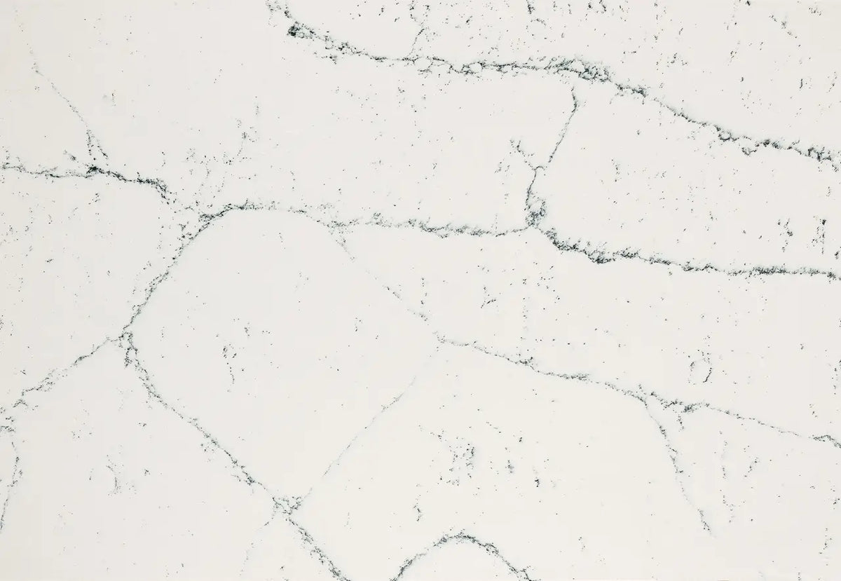 Quartz slab surface with light gray base and dark gray veining — premium countertop fabrication by Signature Stone Las Vegas