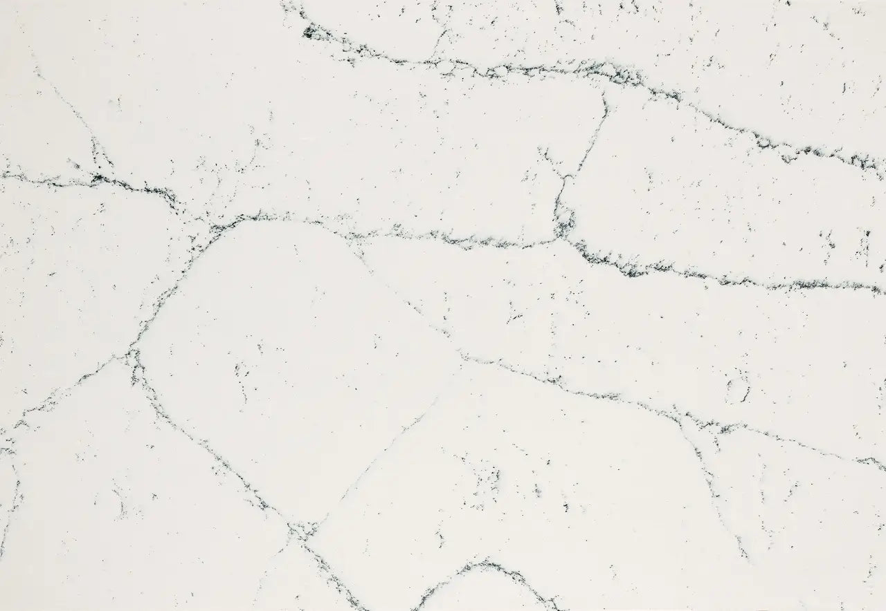 Quartz slab surface with light gray base and dark gray veining — premium countertop fabrication by Signature Stone Las Vegas