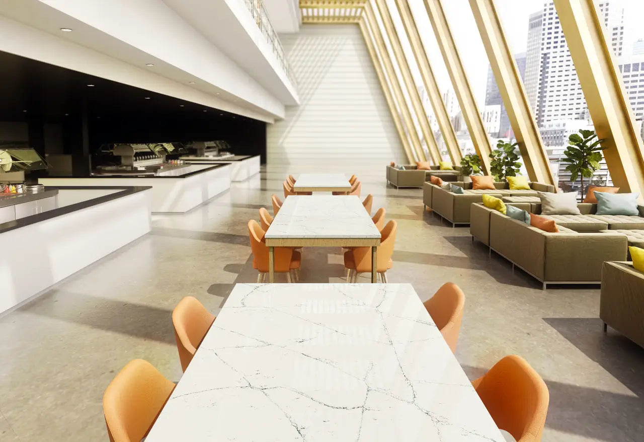 White marble dining tables with gray veining in modern kitchen — premium stone countertops installed by Signature Stone Las Vegas