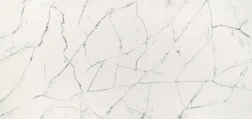Quartz surface with elegant white base and gray veining pattern — custom countertops fabricated and installed by Signature Stone LV
