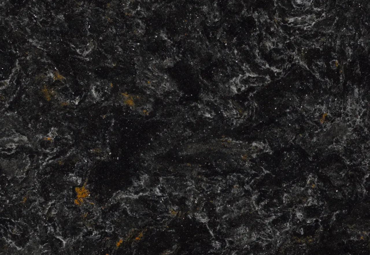 Armitage stone surface featuring deep black base with gray veining and golden accents — custom countertops fabricated and installed by Signature Stone LV